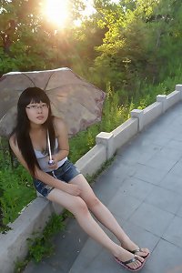 Asia doll with glasses 15